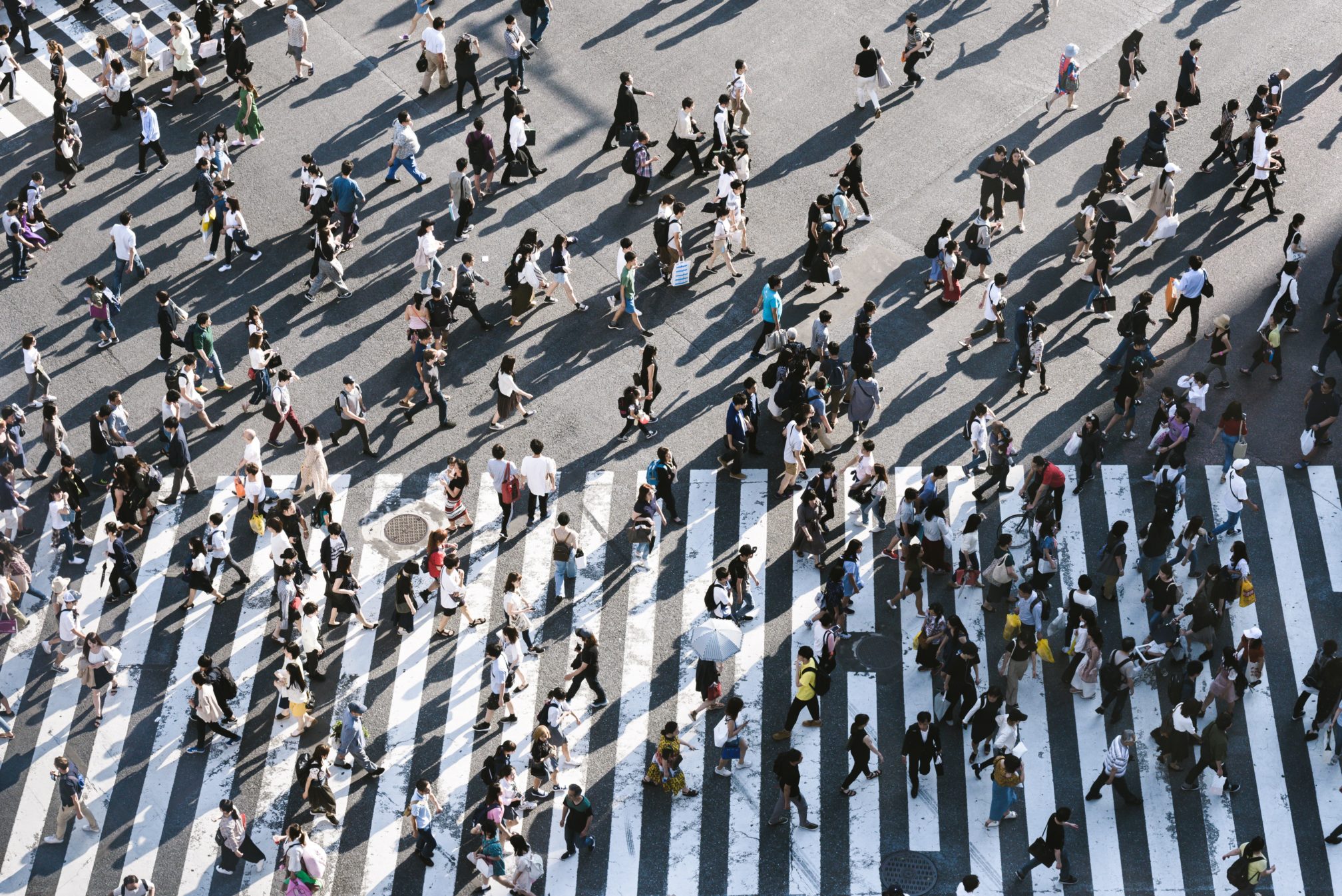 Tons of people crossing the street in China.