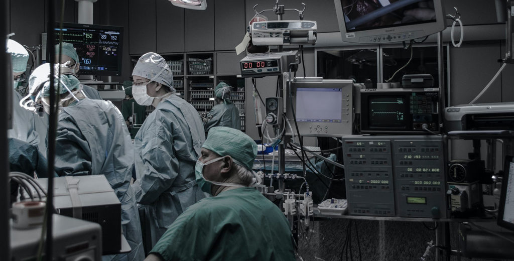Surgeons operating in a hospital