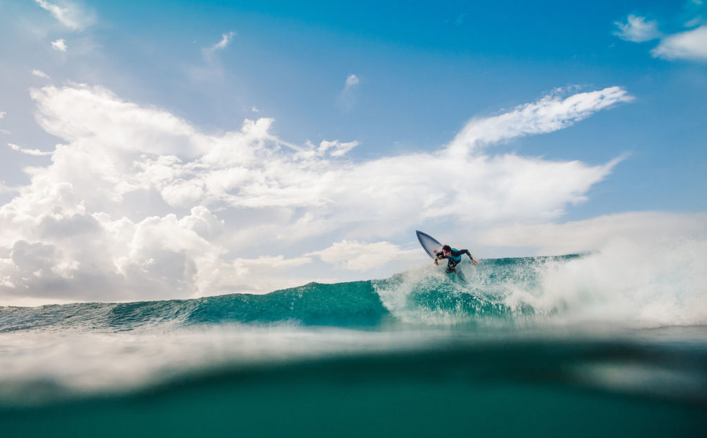 A surfer riding a wave.