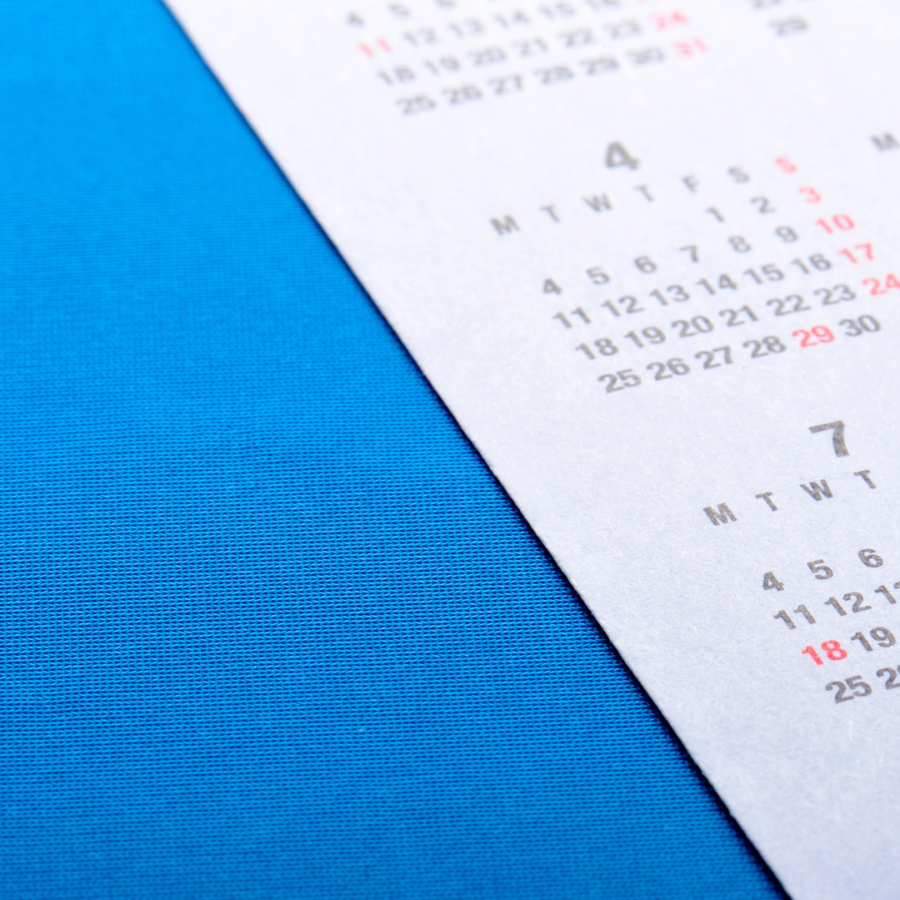 Zoomed in calendar to right of screen on a blue background